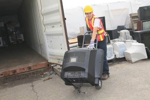 Different skips placed in an urban area of St Johns Wood