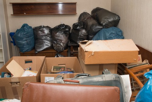 Construction workers managing waste disposal