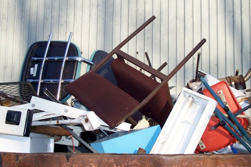 Customer service representative assisting with skip hire